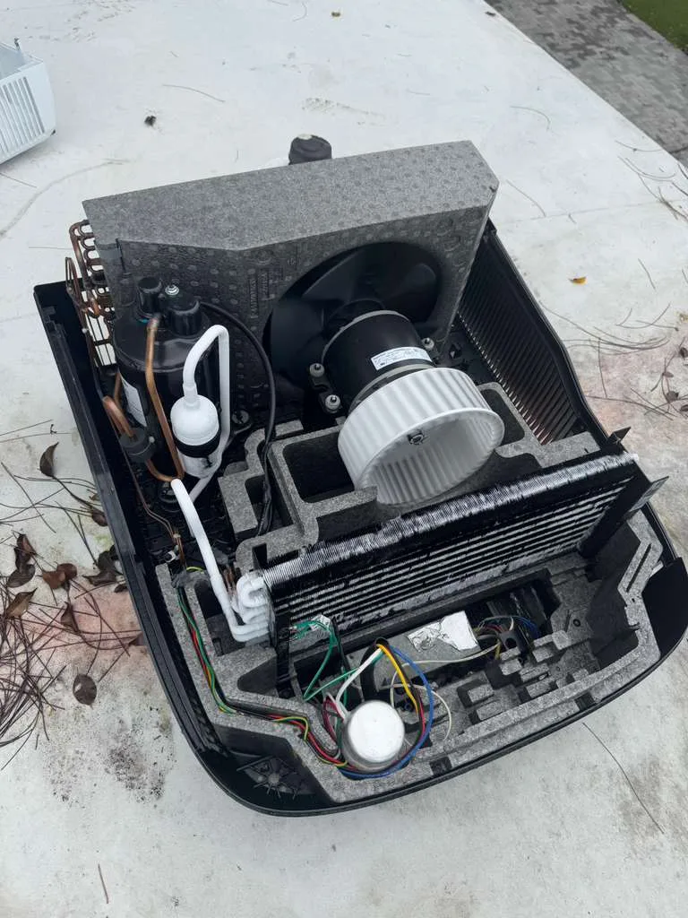 RV AC unit repair and installation in Fort Lauderdale FL - certified technician on rooftop