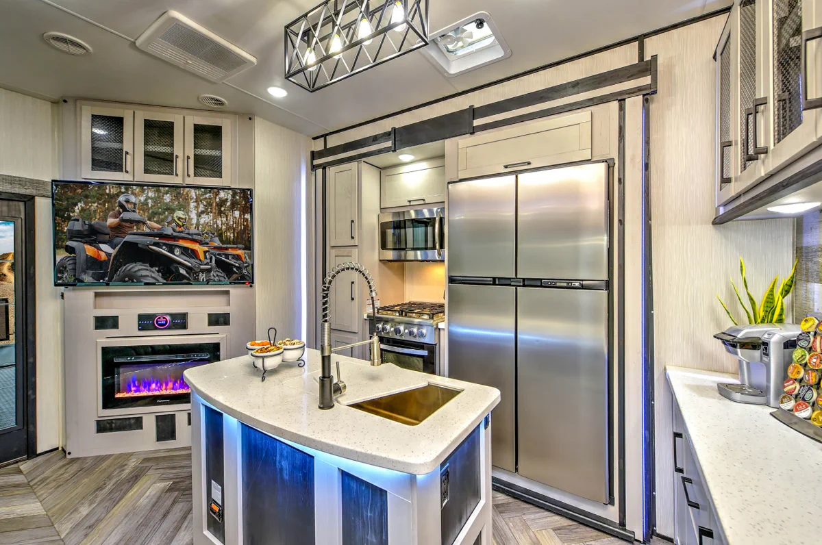 RV appliance repair in Broward County Florida - our mobile appliance specialists at work on a Class A motorhome refrigerator system at a Fort Lauderdale RV park