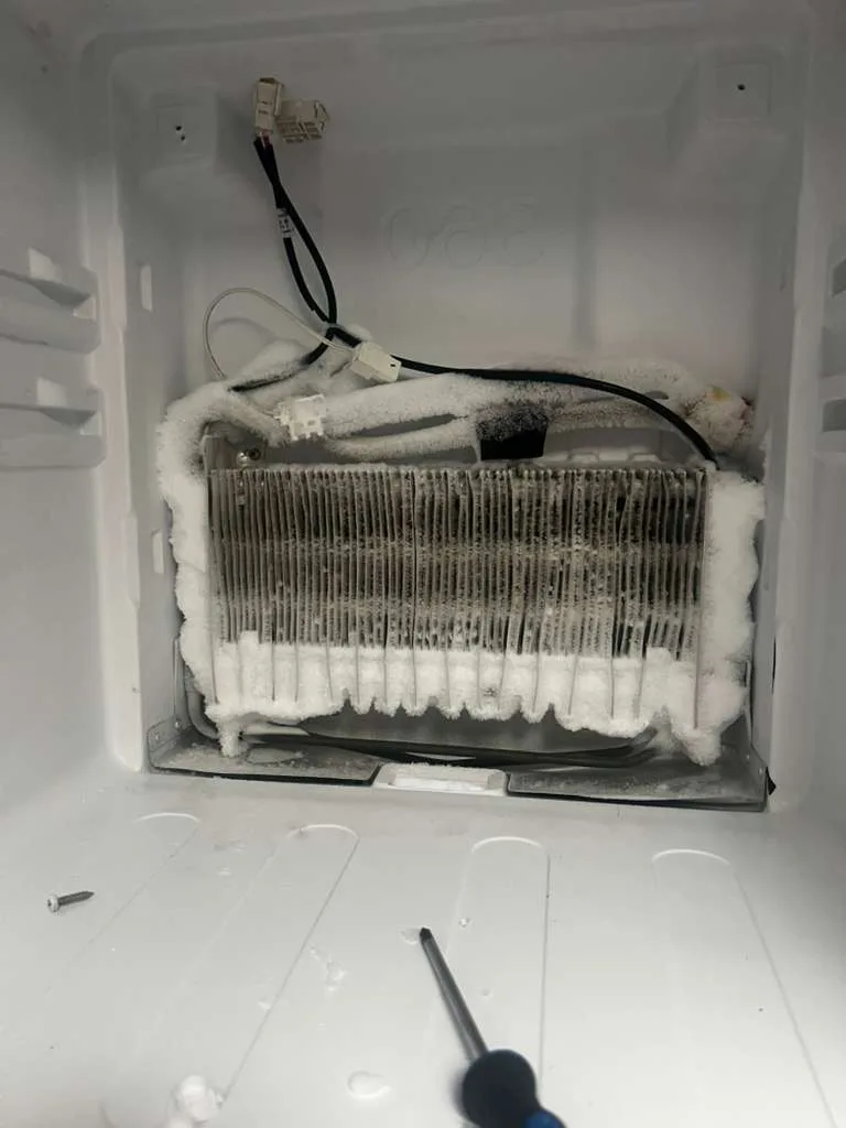 Norcold RV refrigerator control board replacement in Fort Lauderdale FL - our appliance specialists completing board swap on absorption fridge at Broward County RV park