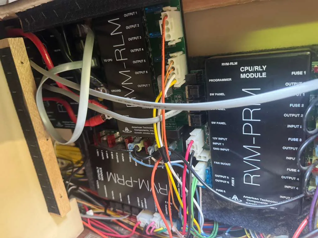 Mobile RV electrical repair in Fort Lauderdale FL - certified technician diagnosing 12V and 120V electrical systems at Broward County campground