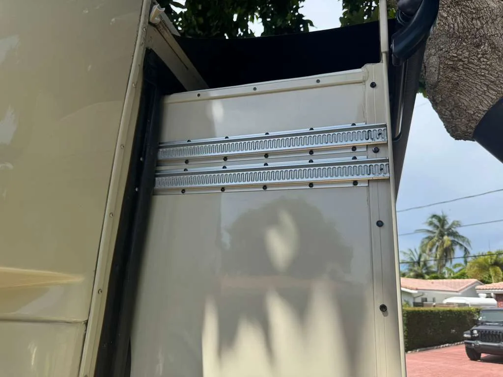 Schwintek slide-out after alignment correction on travel trailer in Fort Lauderdale FL - even seal compression confirmed after calibration