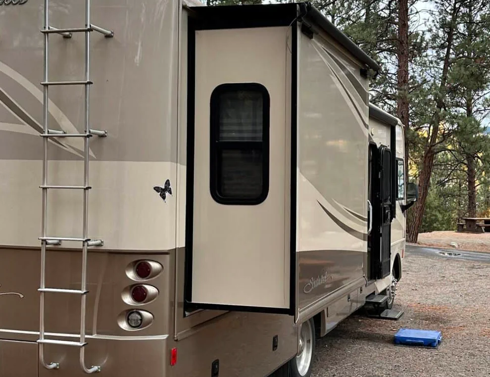 Mobile RV slide-out repair in Fort Lauderdale FL - certified technician servicing Lippert electric slide-out motor at Broward County campground