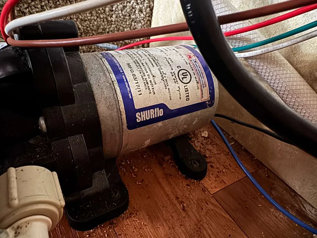 RV water pump replacement in Fort Lauderdale Florida - Shurflo pump diagnosis and installation by certified mobile technician at Broward County campsite